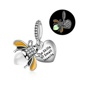 Luminous firefly pendant charm in silver alloy with glowing bead and heart engraving