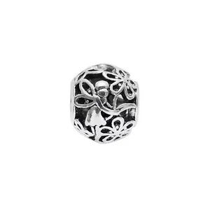 Vintage Tibetan silver hollow charm bead with floral fairy design for DIY jewelry