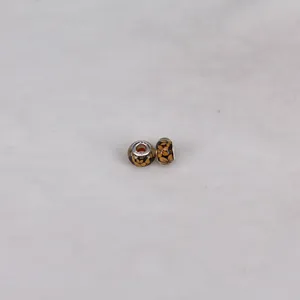 Macro shot of 14mm resin floral beads with S925 silver core for DIY jewelry