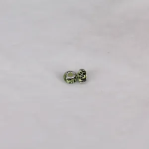 Close-up of S925 silver core and green floral glass bead for DIY European style jewelry