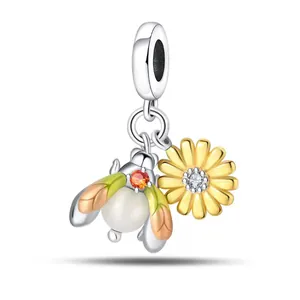 Luminous silver bee and sunflower charm with orange wings and pearl body for bracelets