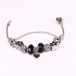 Pandora style snake chain bracelet with black glass beads and silver heart pendant