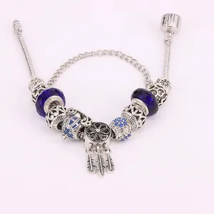 Pulsera con amuleto atrapasueños azul, cuentas de plata S925 y piedras de vidrio azul