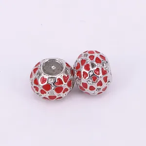 Hollow heart charms with red enamel details for DIY charm bracelets and necklaces