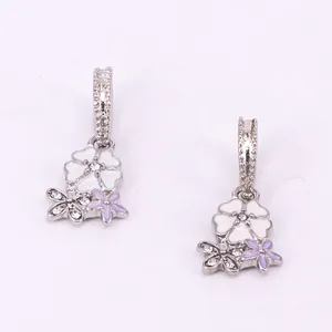 Silver flower pendant with white and purple enamel and zircon stone accents
