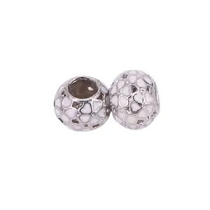 Silver hollow ball charm beads with white enamel heart patterns for DIY bracelets