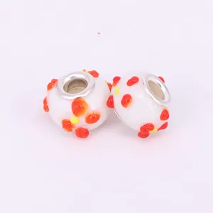 DIY mixed color glass charm beads with white base and orange spots for bracelets