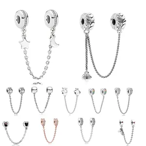 DIY charm bracelet safety chains with moon, star, and heart enamel pendants in silver