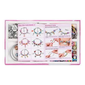 DIY charm bracelet kit for kids featuring colorful beads and metal pendants in a pink box