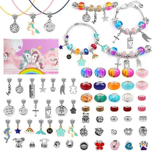 Kids DIY charm bracelet kit with unicorn beads and colorful pendants in gift box