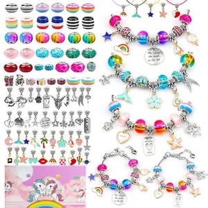 DIY colorful glass bead bracelet set for kids featuring unicorn charms and pink storage box