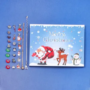 Close-up of a Christmas Advent calendar jewelry kit with charms and two bracelets