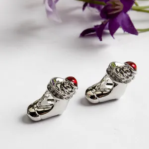 Detail of silver shoe charms with red rhinestones for DIY charm bracelet making