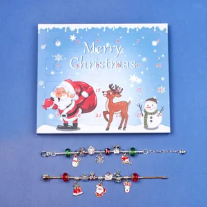 Advent calendar box with Santa illustrations and two Christmas DIY charm bracelets