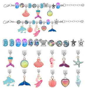 DIY ocean themed charm bracelet set with blue beads and sea animal pendants for kids
