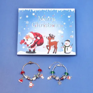Close-up of DIY Christmas advent calendar beads and charms with festive blind box
