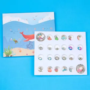 Detail of DIY ocean-themed countdown advent calendar with marine charms and bracelets