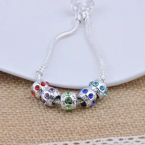 Silver snake chain bracelet with five colorful sparkling rhinestone-encrusted beads