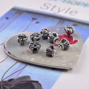 Macro shot of vintage silver crown beads for DIY jewelry making and bracelets