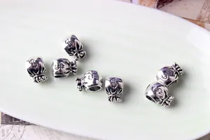 Perles bourse rétro en argent avec signe dollar dans un plateau pour bijoux DIY