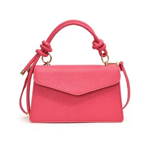 Chic rose red pebble leather handbag with knot handle and gold hardware for women
