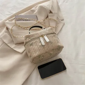 Lace woven straw handbag with floral embroidery and gold chain shoulder strap