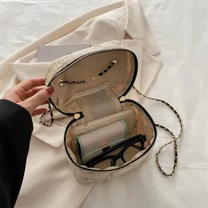 Straw lace crossbody bag for women with chain strap and spacious interior for essentials