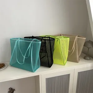 Set de cuatro bolsos de malla grandes para playa y compras en varios colores