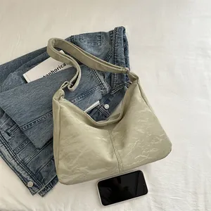 Minimalist sage green pleated tote bag with adjustable strap for casual daily use