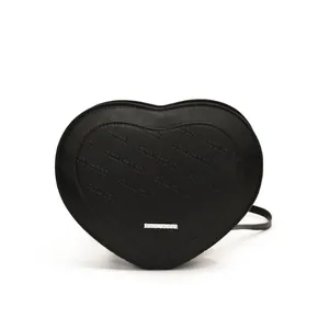 Minimalist black heart-shaped leather crossbody bag with rich rabbit embossed pattern