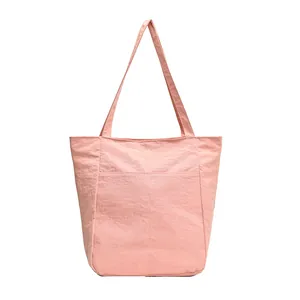 Minimalist pink oxford fabric tote bag with large capacity for daily commuting