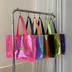 Set of six colorful transparent PVC tote bags with nylon handles in a modern summer style