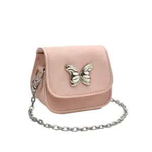 Mini light pink stone pattern crossbody bag with silver bow clasp and chain strap
