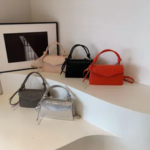 Stylish crocodile texture crossbody bags in five colors with knotted top handles