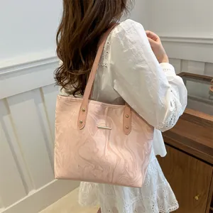 Pink marble pattern leather tote bag with elegant gold hardware for women's daily commute