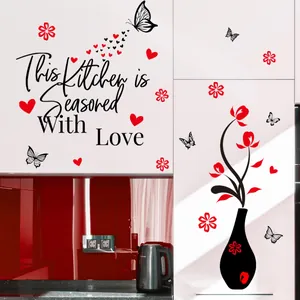 Detail of a kitchen wall sticker with the text This Kitchen is Seasoned With Love