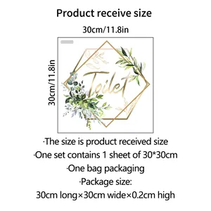 Detailed view of floral toilet sticker with gold hexagon frame and green foliage
