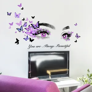 Détail du sticker mural You are Always Beautiful avec papillons violets et motif d'œil
