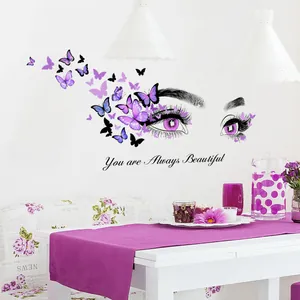 Sticker mural autocollant avec yeux, papillons violets et texte You are Always Beautiful