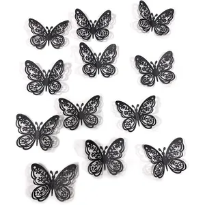 Set of 12 black 3D glitter butterfly wall stickers with intricate hollow flower patterns