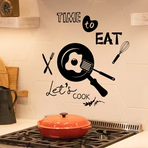 Detail of kitchen wall decal with black silhouette cookware and Time to Eat text