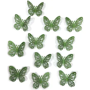 Detail of 12pcs green glitter 3D butterfly wall stickers with intricate hollow lace patterns