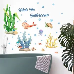 Macro detail of ocean animal wall decals with whale, turtle and 'Wash The Bathroom' text
