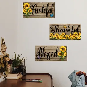 Detailed view of rustic Grateful Thankful Blessed wooden wall signs with sunflowers