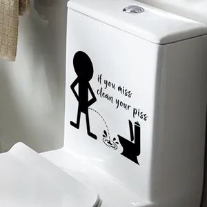 Sticker de toilette humoristique avec silhouette et texte sur céramique blanche