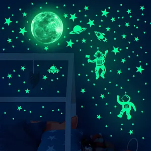 Glow in the dark astronaut and moon wall stickers with green luminous star decals