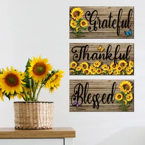 Three-piece sunflower wall art set featuring Grateful Thankful Blessed calligraphy