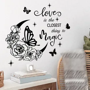 Detail of moon floral wall sticker with quote Love is the Closest thing to Magic