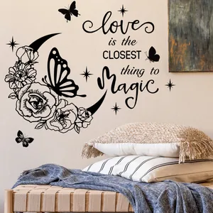 Floral moon and butterfly wall decal with Love is Magic quote for bedroom decor