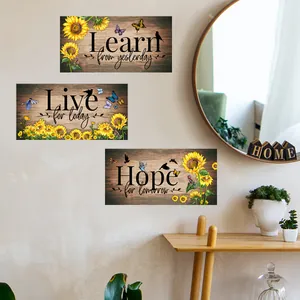 Three-piece sunflower wall art set featuring inspirational English quotes and butterflies